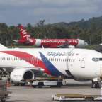 Malaysia Airlines, en «bancarrota» por dos tragedias aéreas,Economia,Espionaje de la NSA,Fifa,